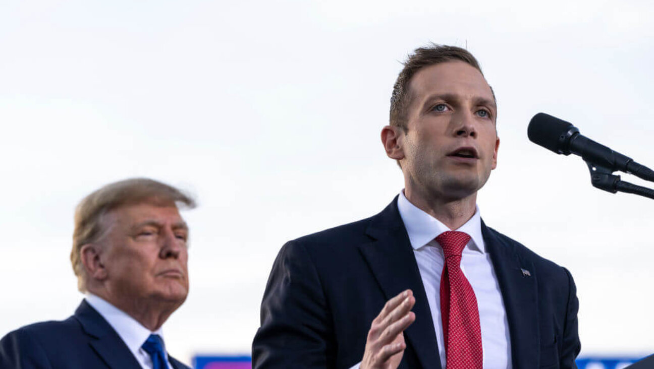 Max Miller, then a Republican candidate for Ohio's 7th congressional district, spoke during a rally hosted by President Trump at the Delaware County Fairgrounds in 2022.