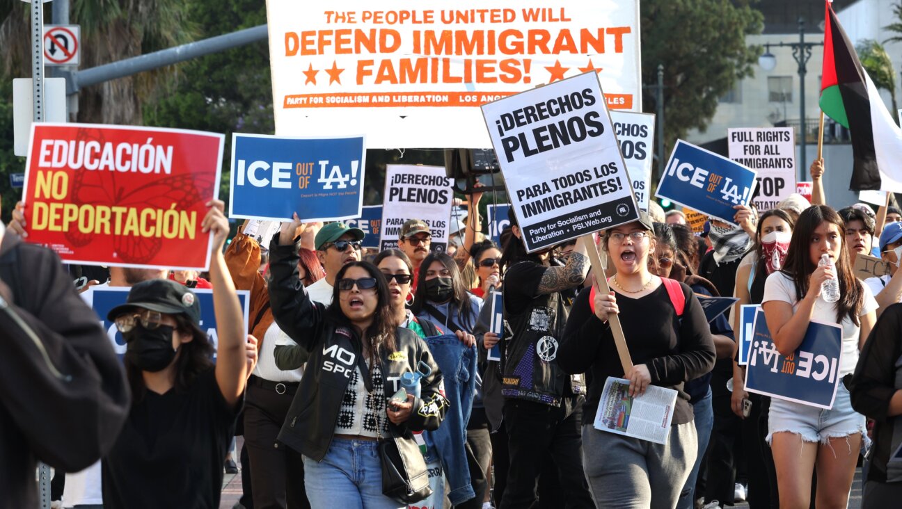 Over 300 immigrant rights activists protest multiple immigration sweeps across Los Angeles by U.S. Immigration and Customs Enforcement agents  in front of the Federal Building in downtown Los Angeles on June 5, 2025. 